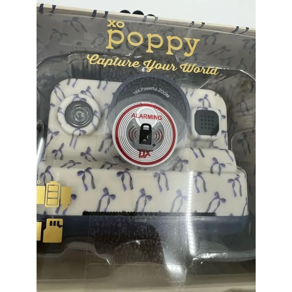 NIB XO Poppy White Digital insta-print Camera with Blue ribbon Accents